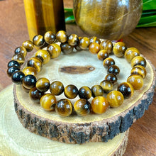 Load image into Gallery viewer, Tigers Eye Willpower 8mm Stretch Bracelet