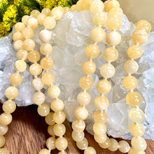 Load image into Gallery viewer, Honey Calcite Sunny Energy &amp; Self-Confidence 108 Hand Knotted Mala with Point Charm Pendant Necklace